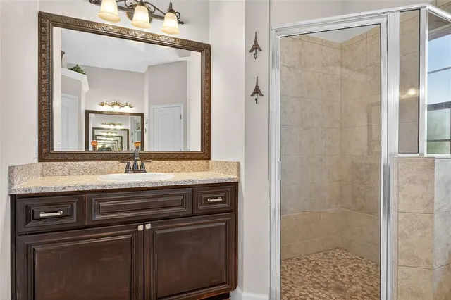 a view of a porch with wooden floor and outdoor space