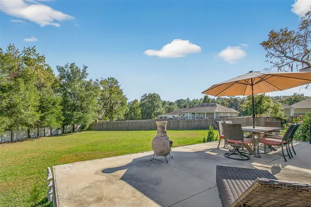 a view of a golf course with a swimming pool