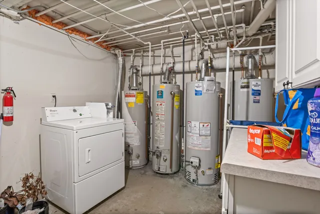 a utility room with dryer and washer