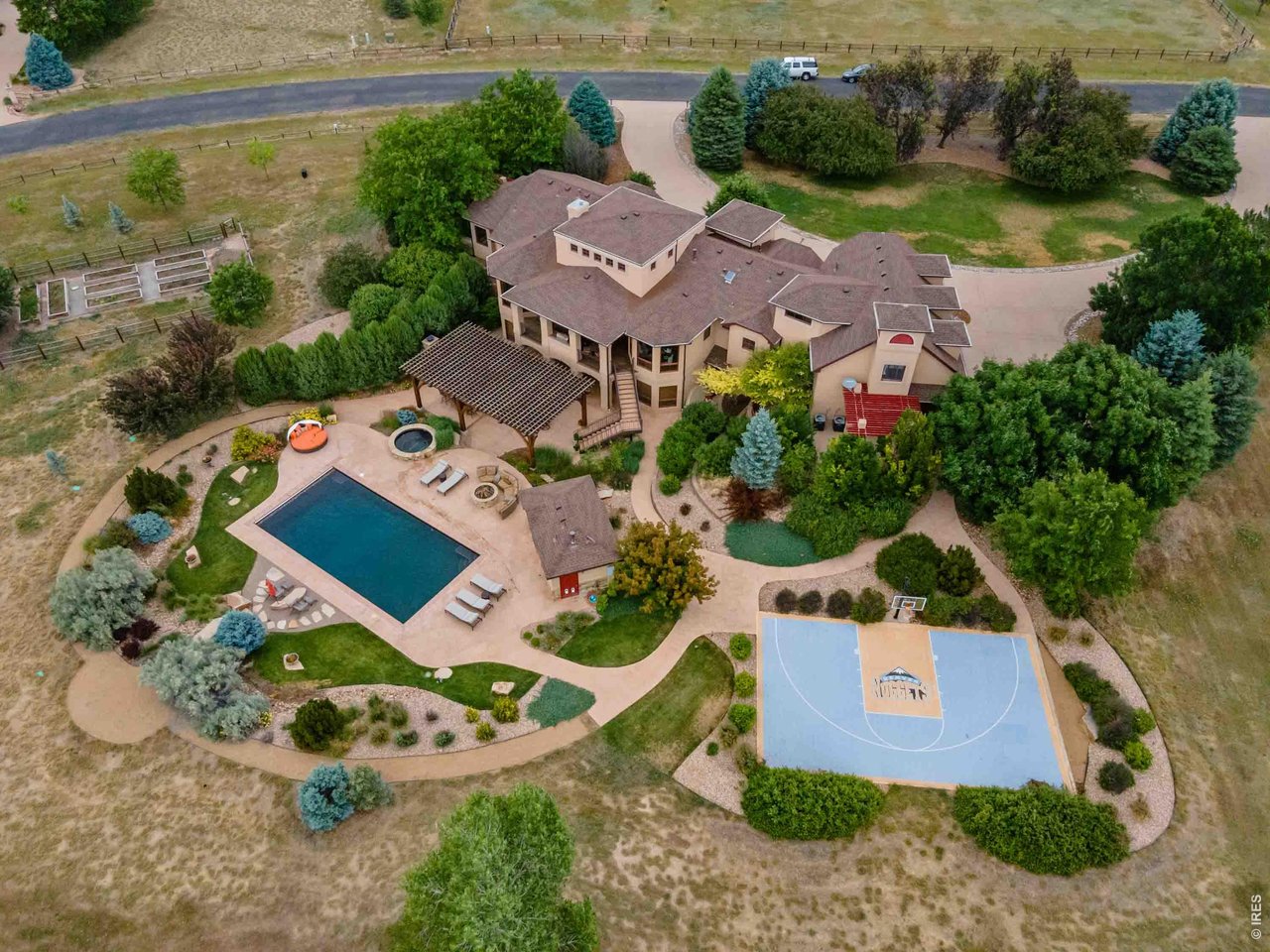 964 Riparian Way Fort Collins, CO 80524 - Photo 38 of 42 an aerial view of a house with garden space and street view