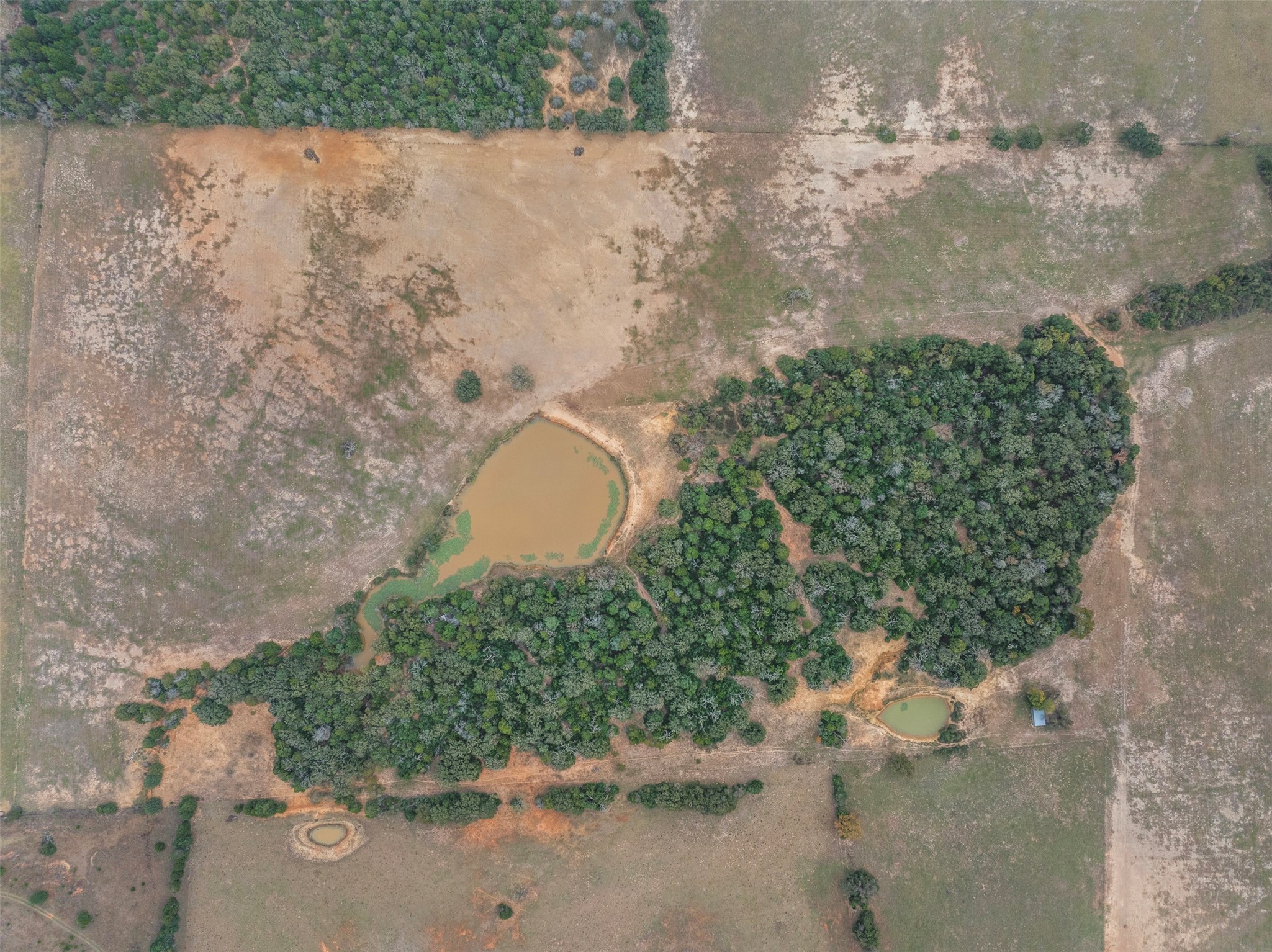 0 Stockade Ranch Road Paige, TX 78659 - Photo 31 of 40 a aerial view of a house with a yard and lake view
