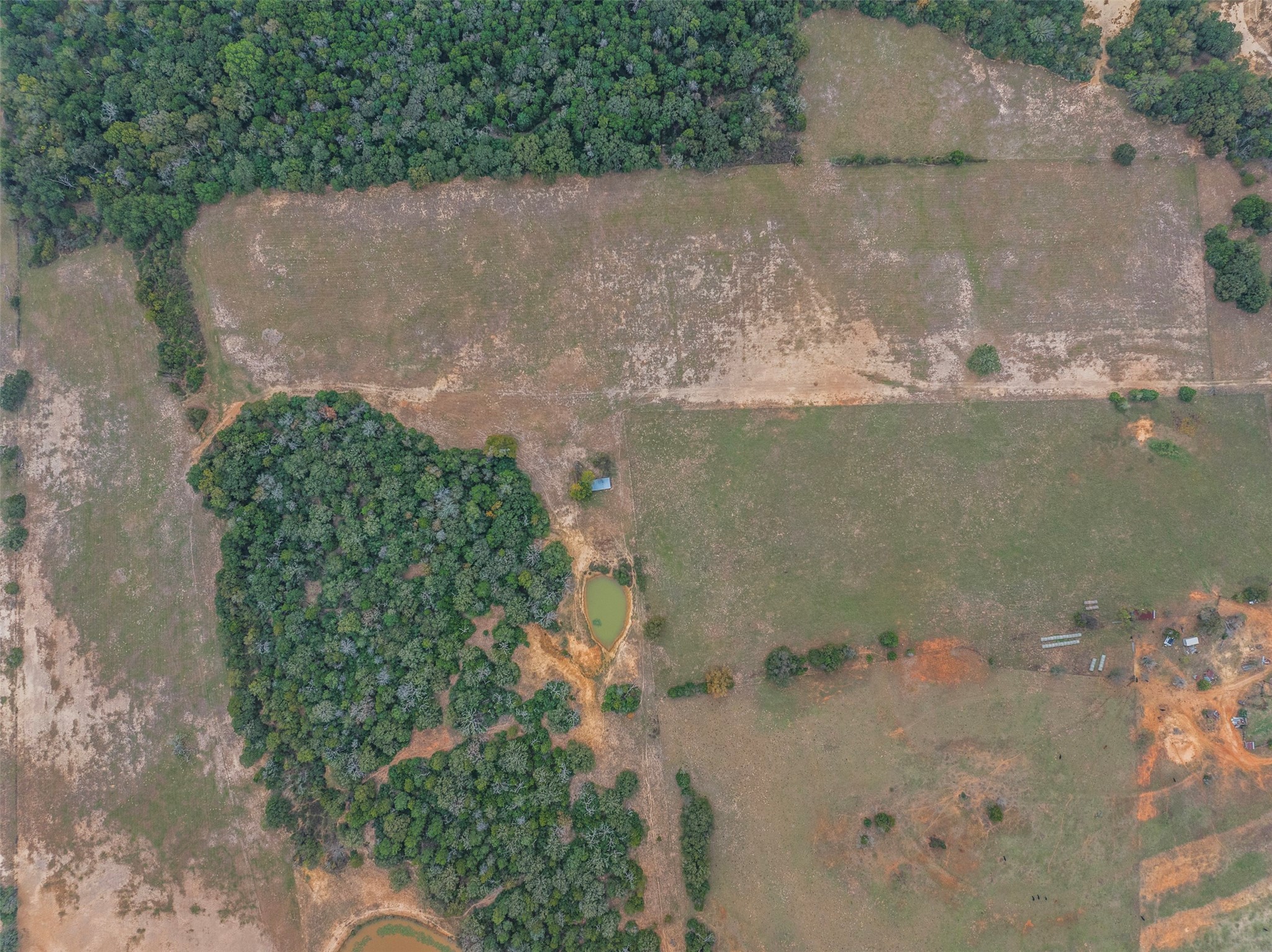 0 Stockade Ranch Road Paige, TX 78659 - Photo 33 of 40 an aerial view of a house with a yard