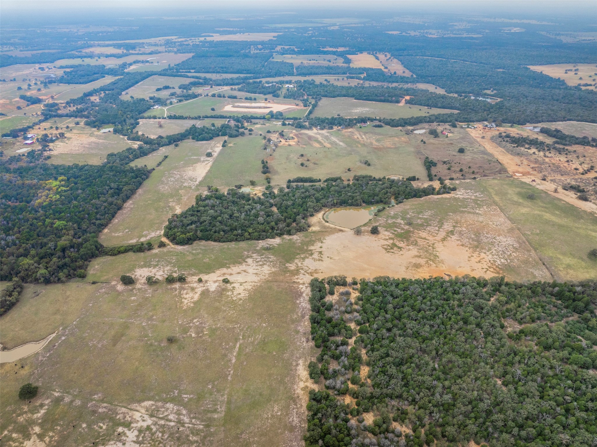 0 Stockade Ranch Road Paige, TX 78659 - Photo 35 of 40 an aerial view of residential houses with outdoor space