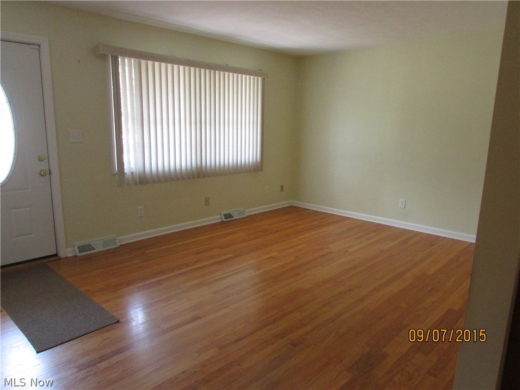 3667 Longfield Road Ravenna, OH 44266 - Photo 5 of 20 The living room bedrooms and eating area have beautiful hardwood floors.