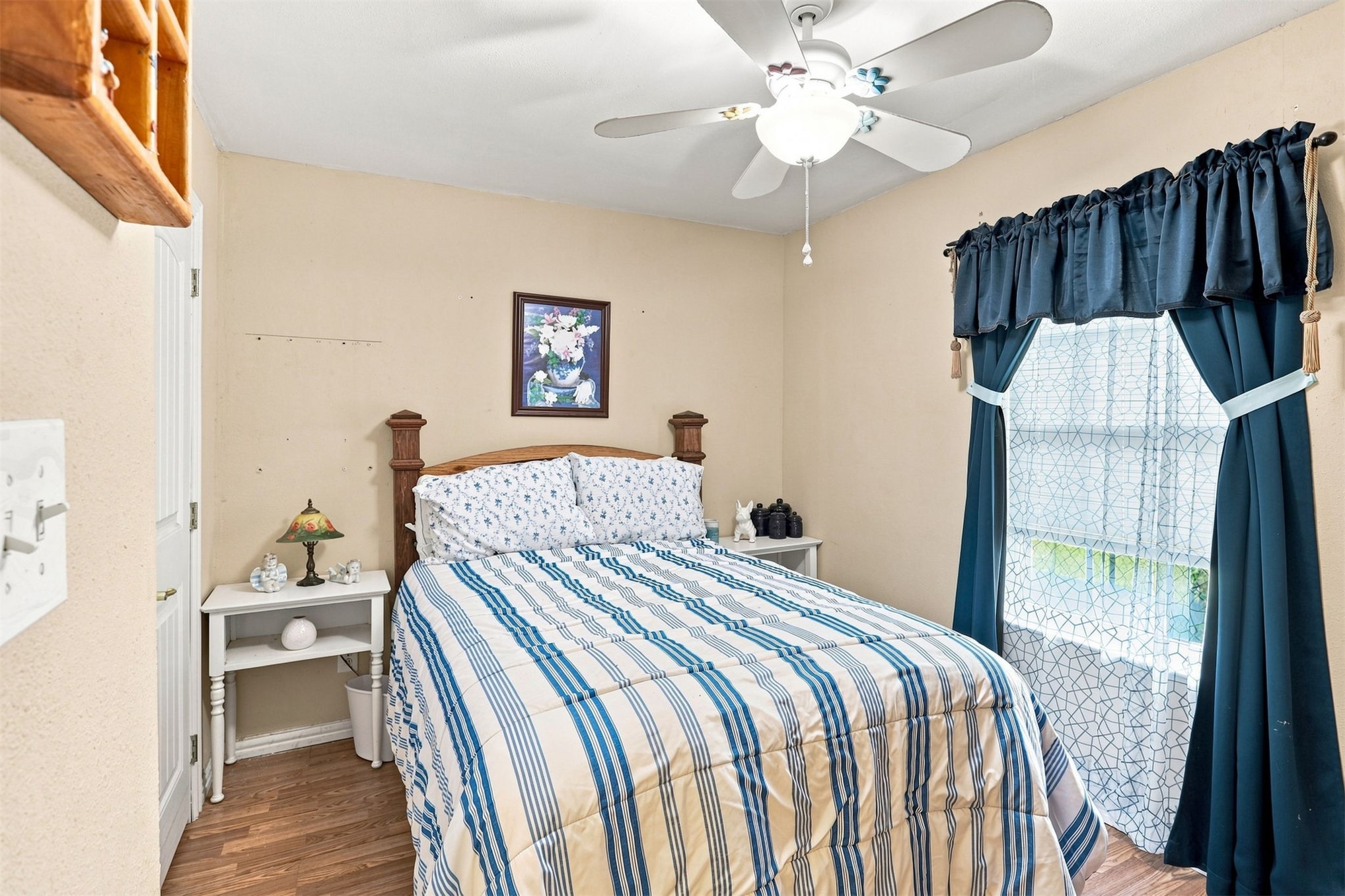 208 West Umstead Colbert, OK 74733 - Photo 19 of 25 Wood-finish flooring with a ceiling fan and overhead lighting