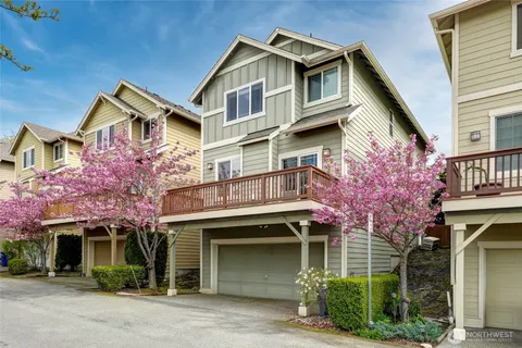 a front view of a house with a garage