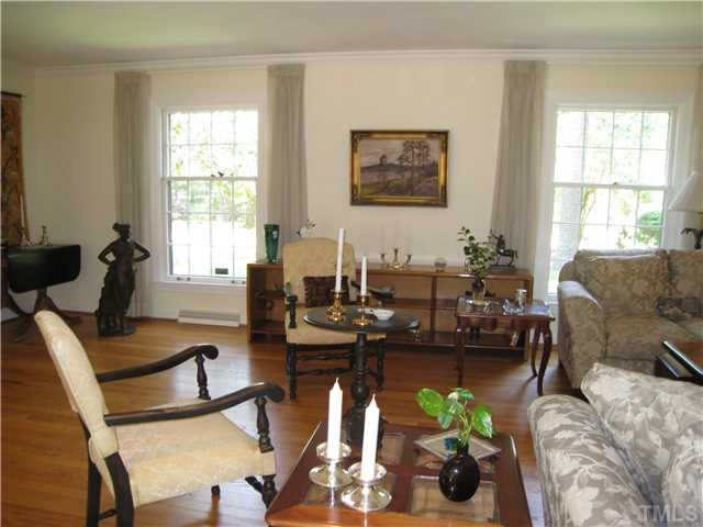 2756 McDowell Road Durham, NC 27705 - Photo 12 of 25 Another view of the Living Room. Two large windows on one side & enclosed porch on the other give this room a lot of natural light. Living Room
