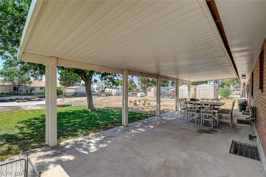 3765 Berkeley Street Logandale, NV 89021 - Photo 65 of 87 Enjoy outdoor living on this expansive covered patio, perfect for alfresco dining and relaxation.