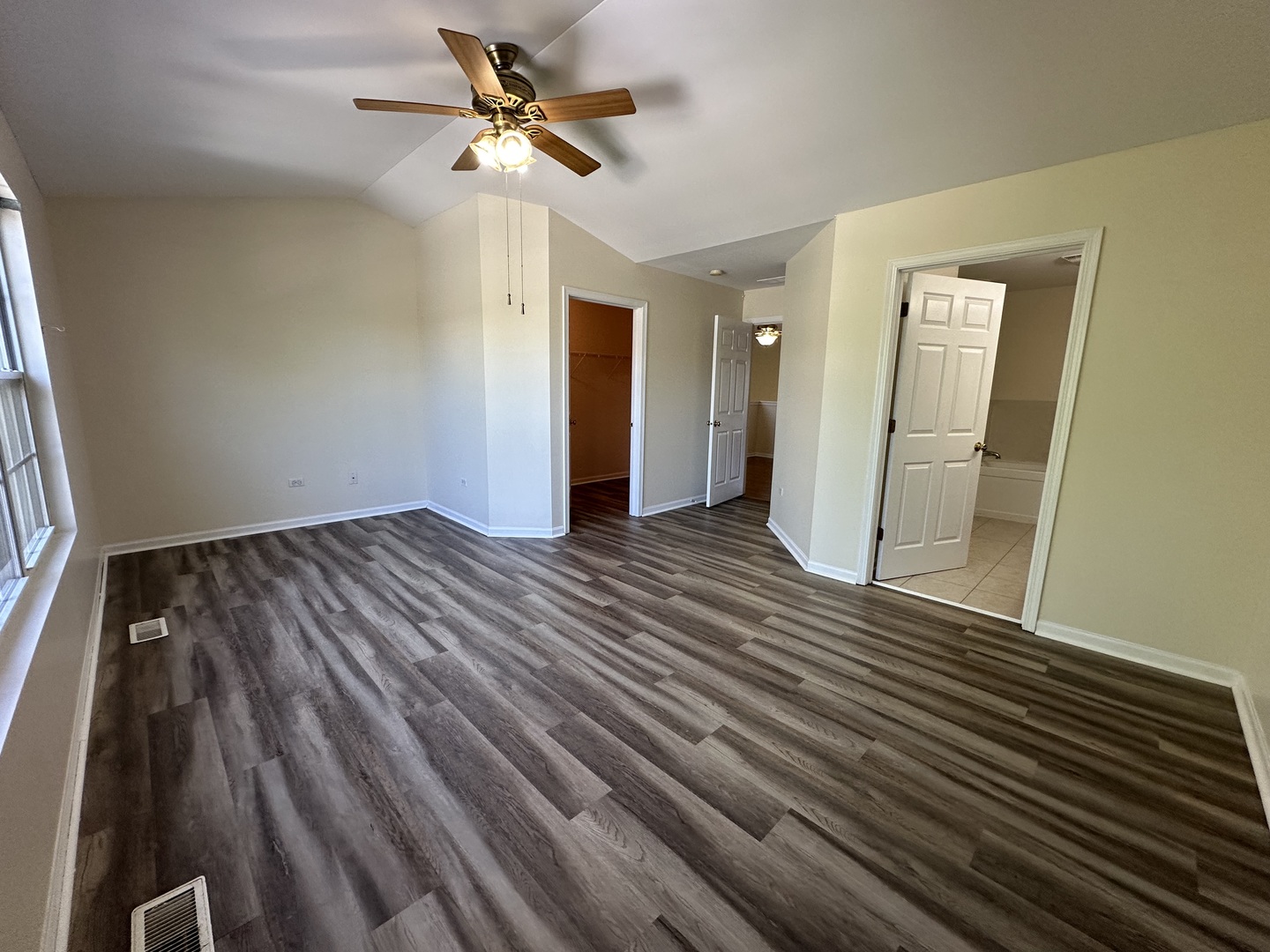 1525 Envee Drive Bolingbrook, IL 60490 - Photo 11 of 30 wooden floor in an empty room with a window
