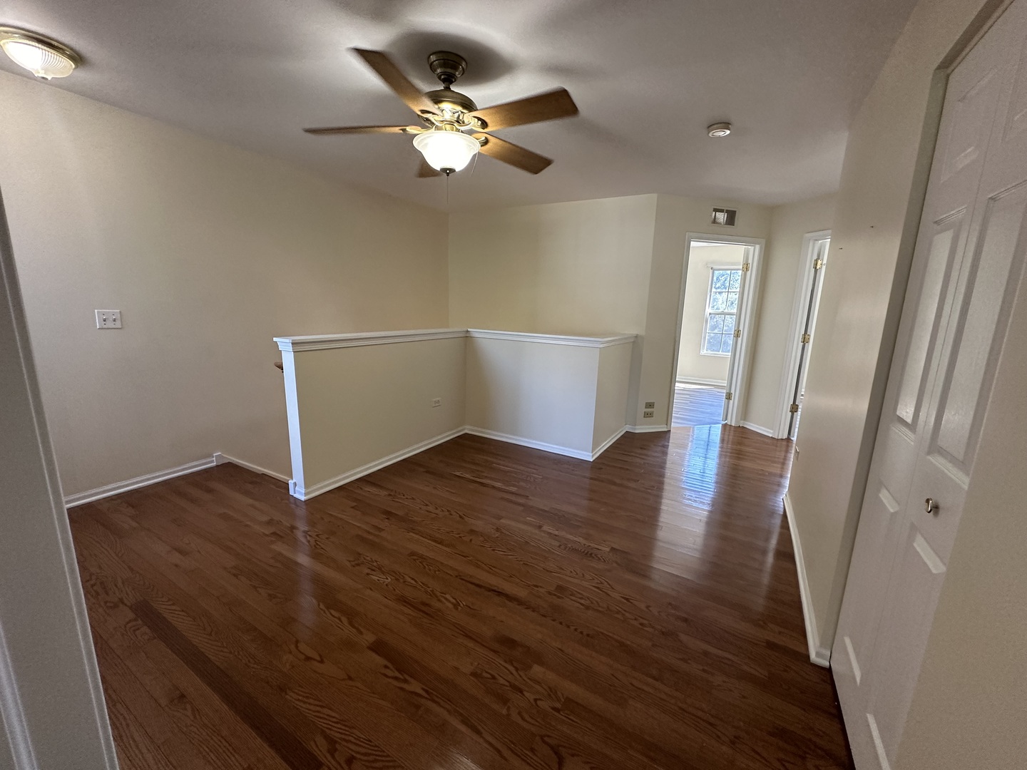 1525 Envee Drive Bolingbrook, IL 60490 - Photo 19 of 30 an empty room with wooden floor and window