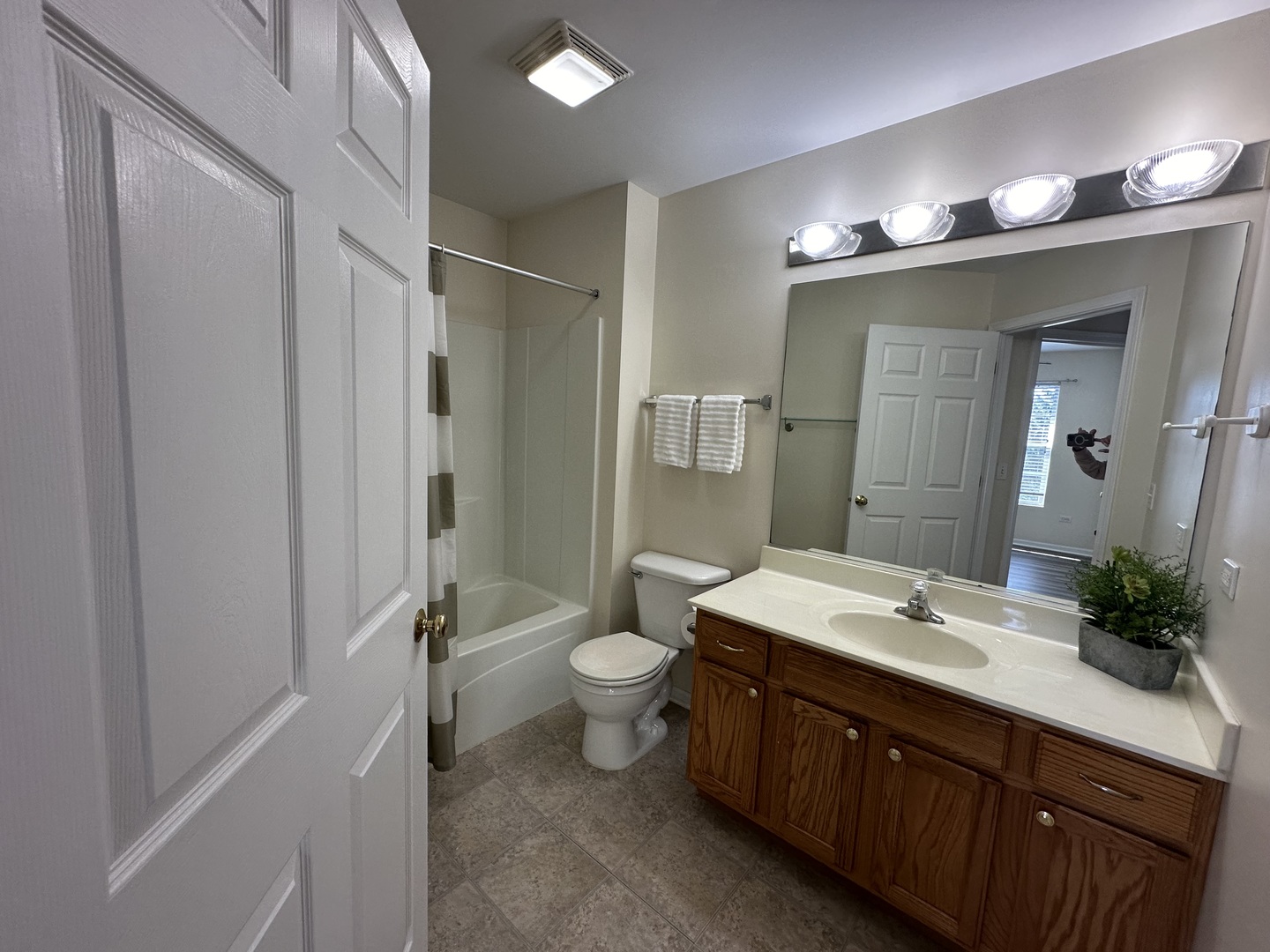 1525 Envee Drive Bolingbrook, IL 60490 - Photo 21 of 30 a spacious bathroom with a double vanity sink mirror and toilet