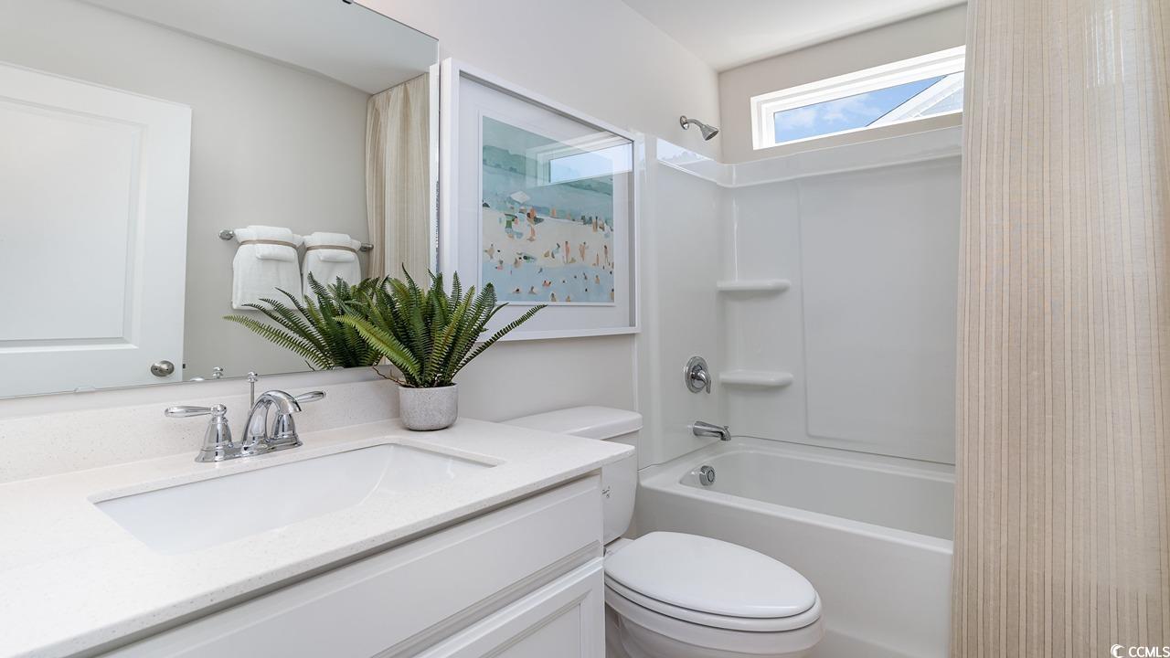 571 Haven View Way Murrells Inlet, SC 29576 - Photo 24 of 26 Full bathroom with vanity, toilet, and washtub / s