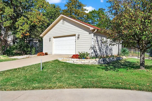 a house view with a garden space
