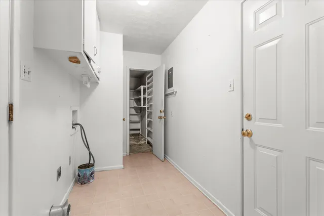 a view of yard with swimming pool and green space