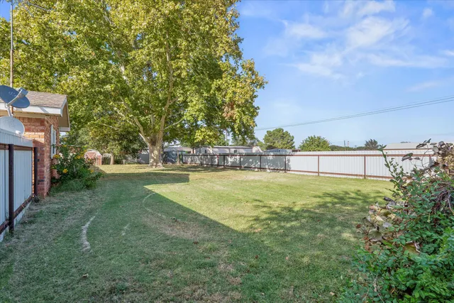 a house view with a garden space