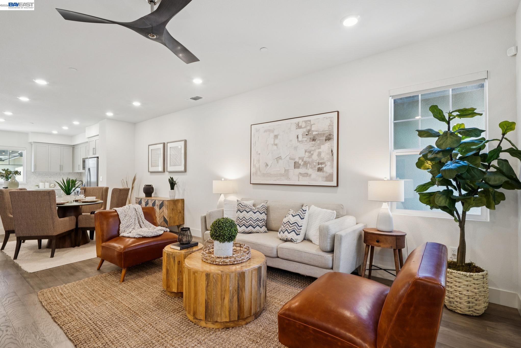 57109 Via Vicenza San Ramon, CA 94583 - Photo 21 of 54 a living room with furniture potted plant and a table