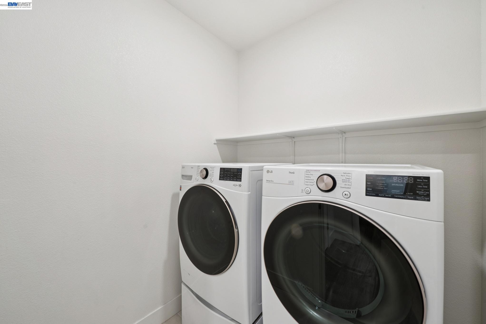 57109 Via Vicenza San Ramon, CA 94583 - Photo 25 of 54 a utility room with dryer and washer