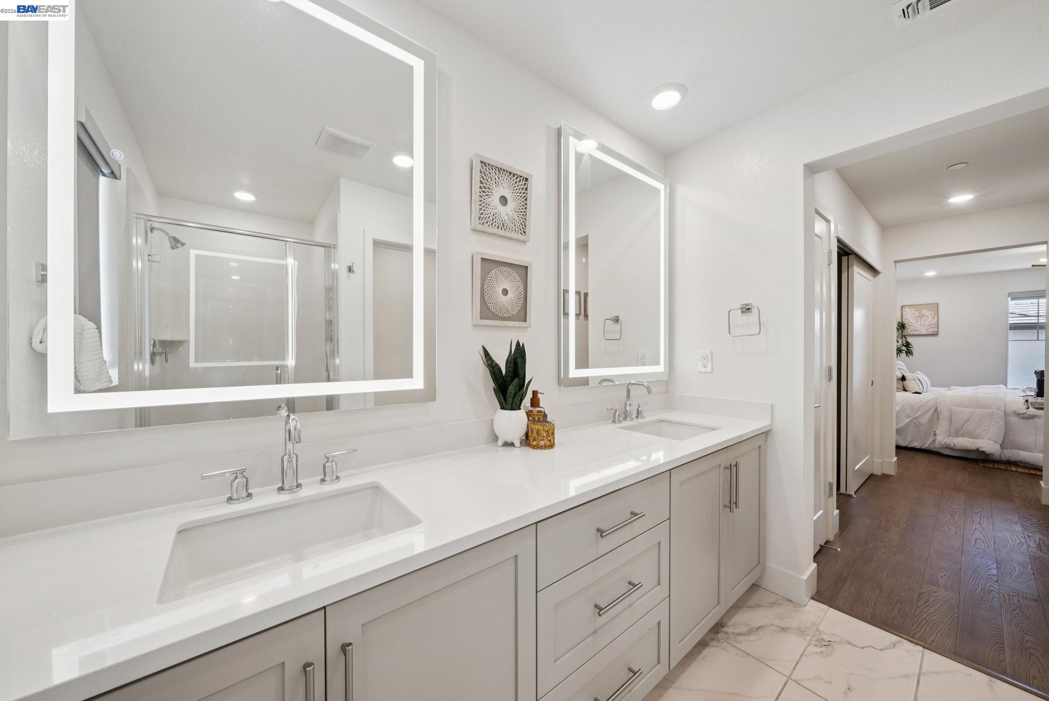 57109 Via Vicenza San Ramon, CA 94583 - Photo 37 of 54 a en suite bathroom with double sink and a large mirror