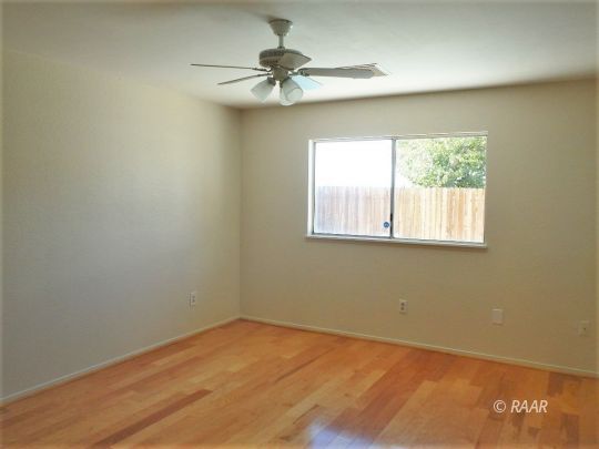 633 South Gemstone Street Ridgecrest, CA 93555 - Photo 21 of 35 an empty room with a window