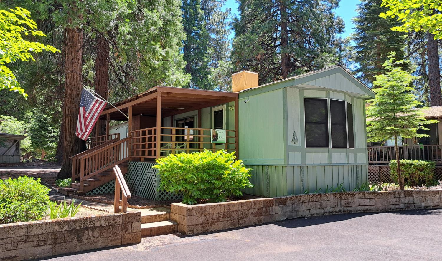 5766 Pony Express Trail, Unit 4 Pollock Pines, CA 95726 - Photo 17 of 17 a front view of a house with porch
