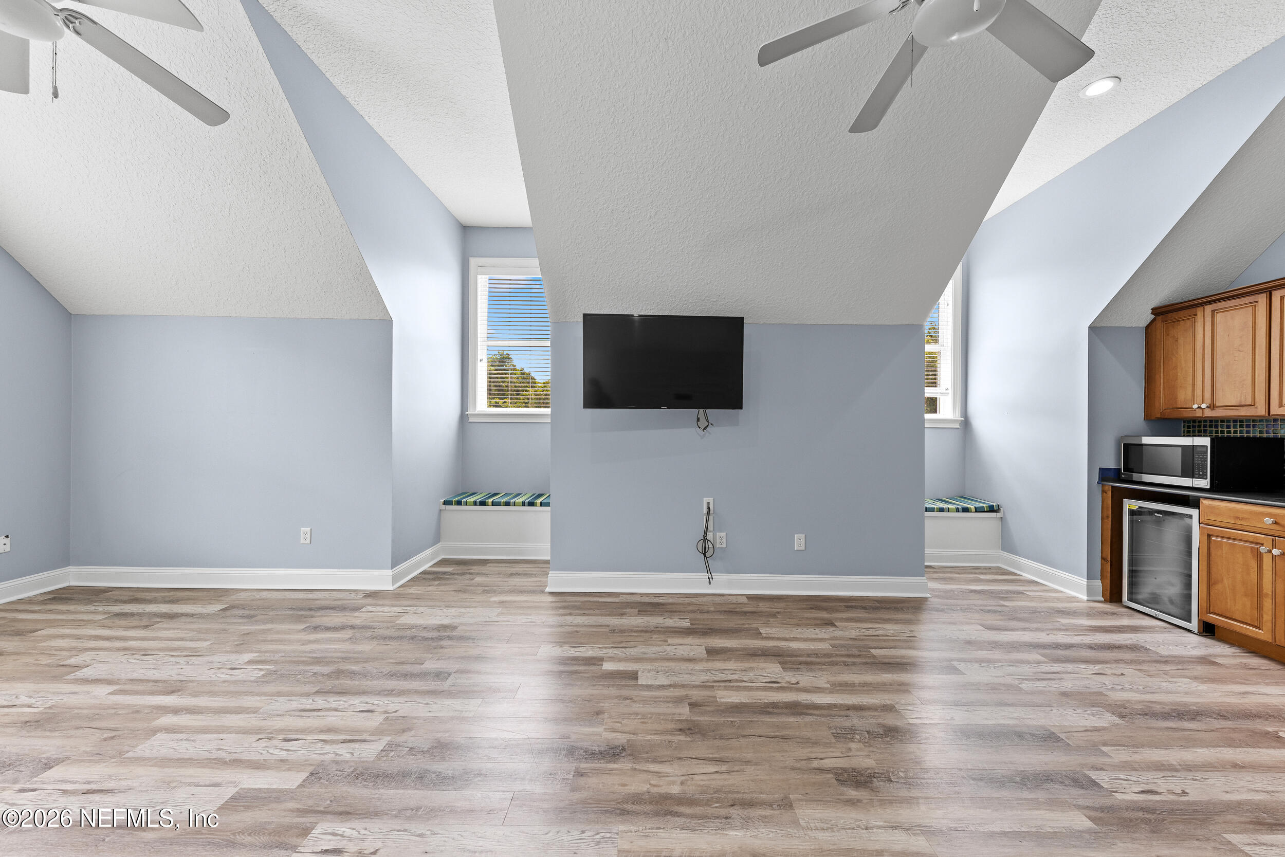3225 Bishop Estates Road St. Johns, FL 32259 - Photo 58 of 90 a view of a livingroom with a flat screen tv