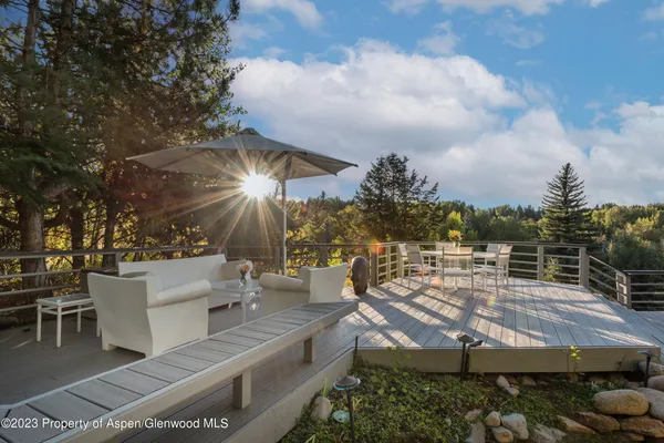 a view of a terrace with sitting area