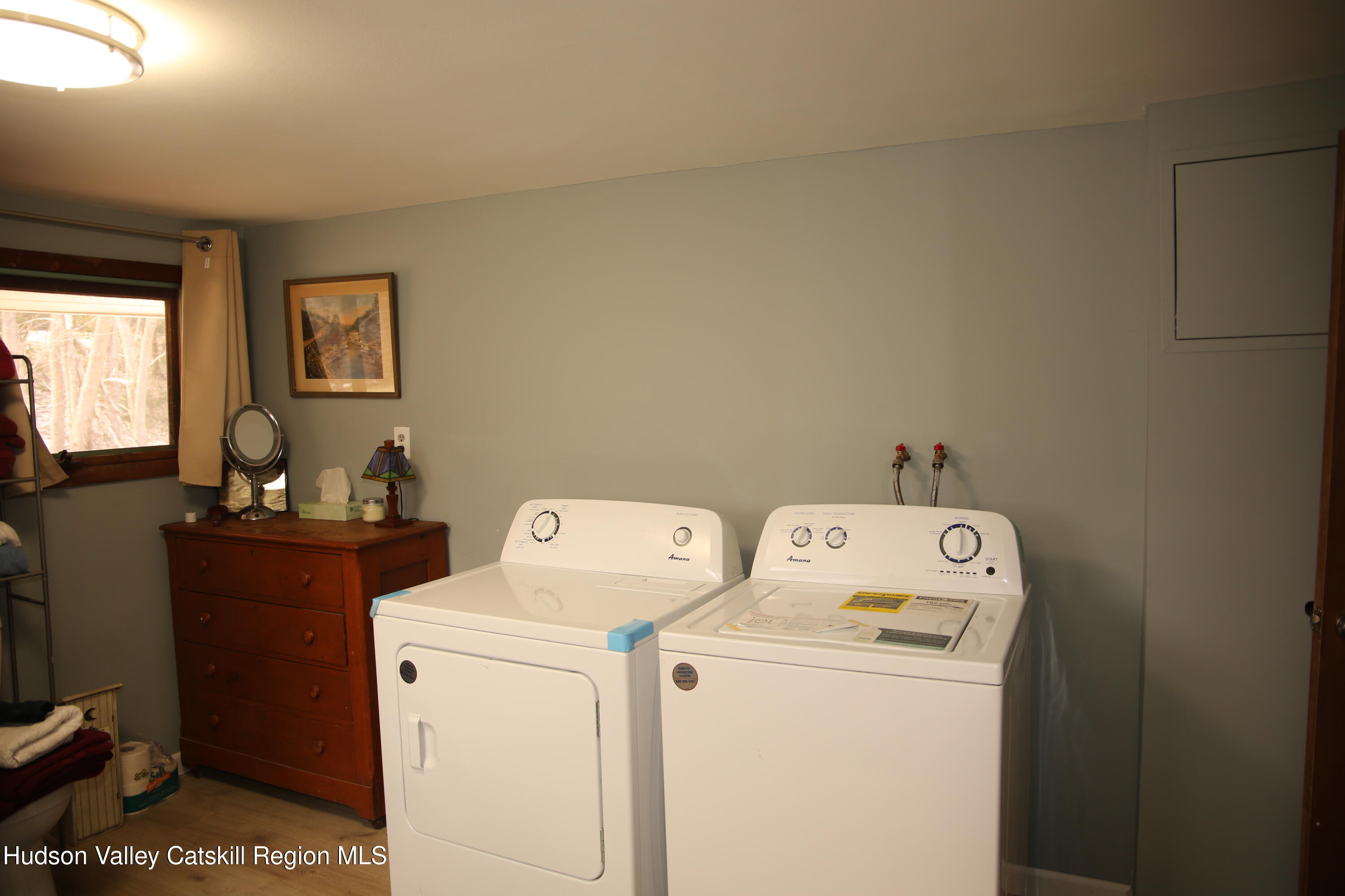 784 Old Rte 28, Unit MAIN STREET WEST OF DEPOT Fleischmanns, NY 12430 - Photo 13 of 19 a view of storage and utility room with washer and dryer