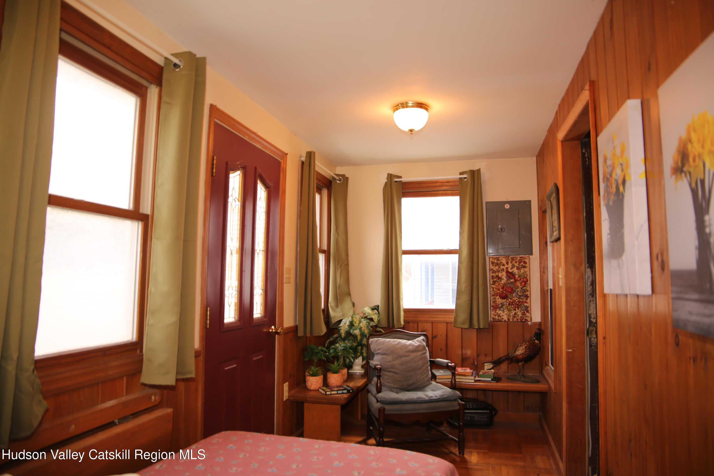 784 Old Rte 28, Unit MAIN STREET WEST OF DEPOT Fleischmanns, NY 12430 - Photo 10 of 19 a living room with furniture and large windows