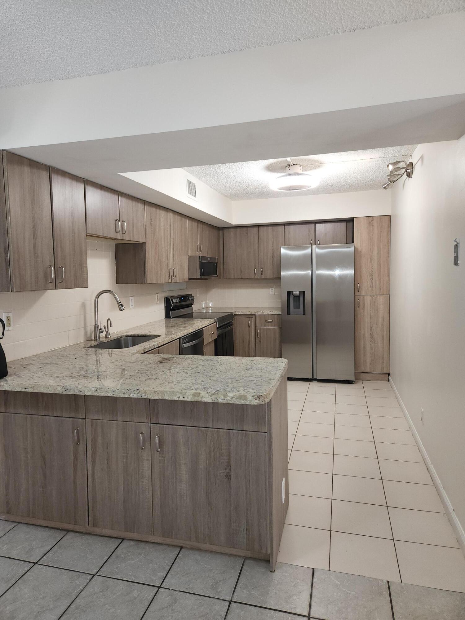 3171 Leewood Terrace, Unit L134 Boca Raton, FL 33431 - Photo 4 of 12 20220706_174933