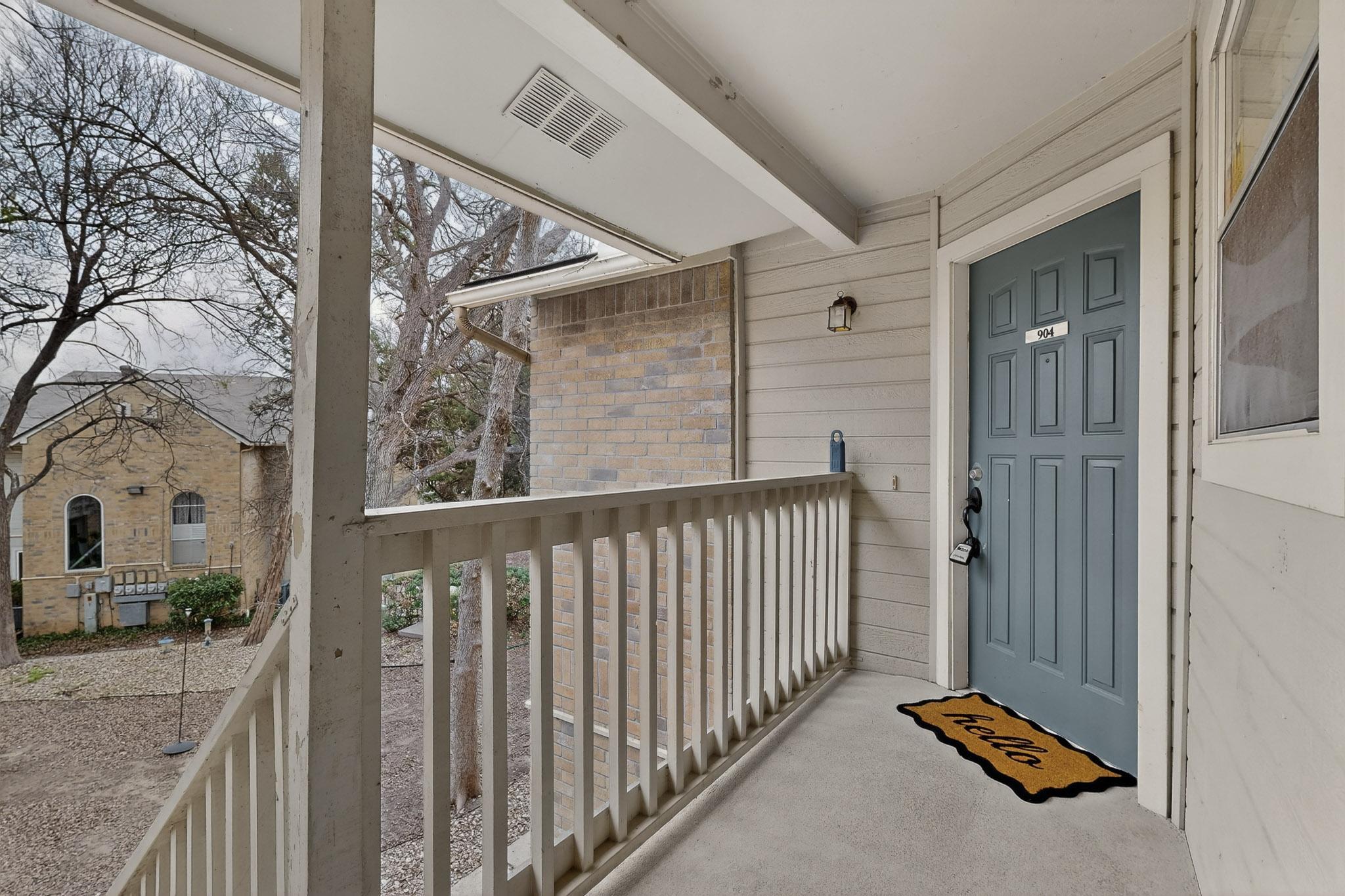 2450 Wickersham Lane, Unit 904 Austin, TX 78741 - Photo 31 of 35 a view of a porch with a door