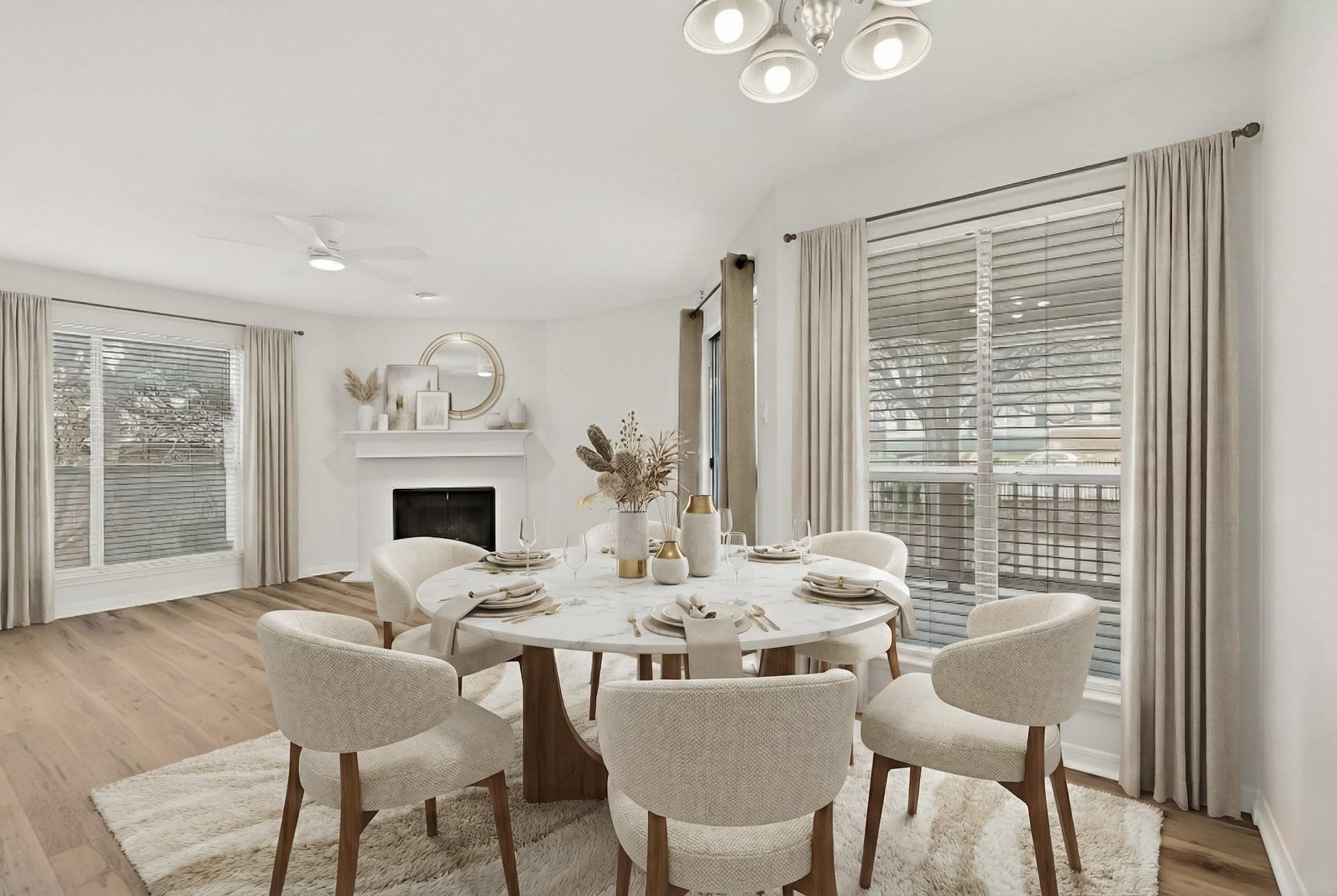 2450 Wickersham Lane, Unit 904 Austin, TX 78741 - Photo 7 of 35 a view of a dining room with furniture window and wooden floor
