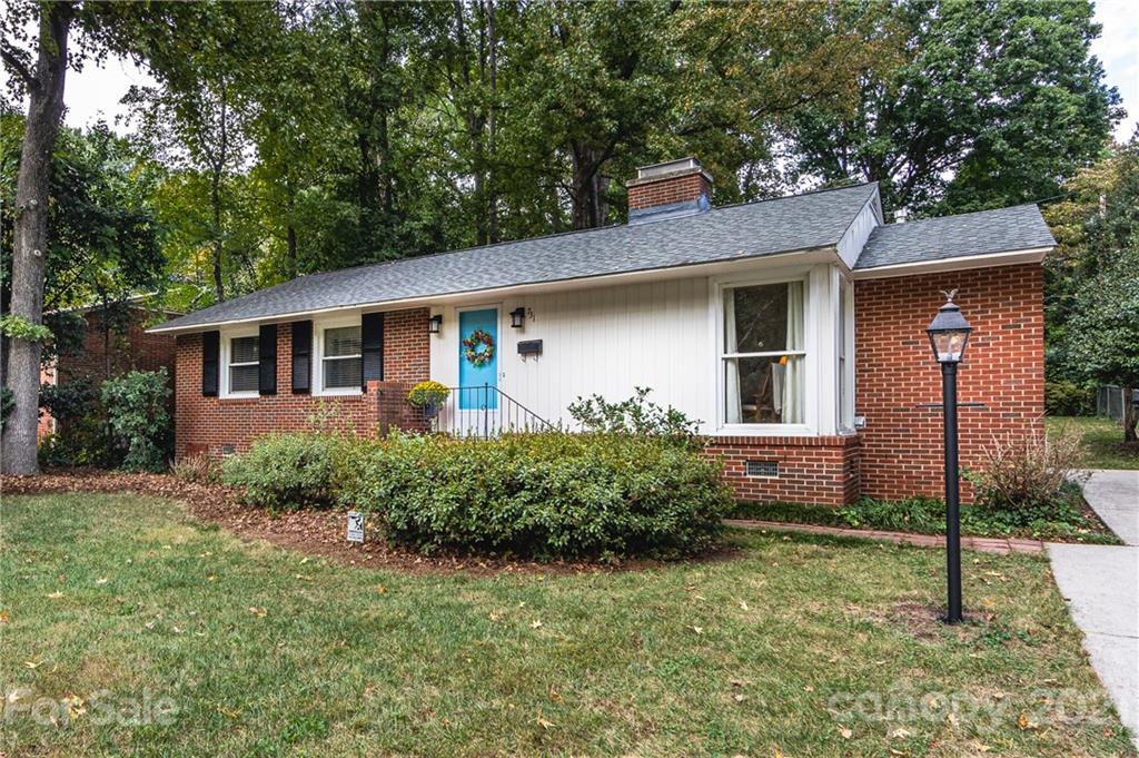 731 Lochridge Road Charlotte, NC 28209 - Photo 1 of 31 front view of a house with a yard