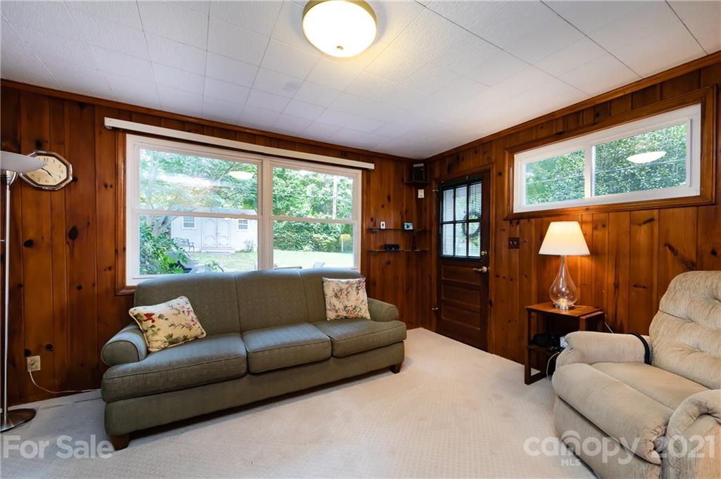 731 Lochridge Road Charlotte, NC 28209 - Photo 11 of 31 a living room with furniture and a large window