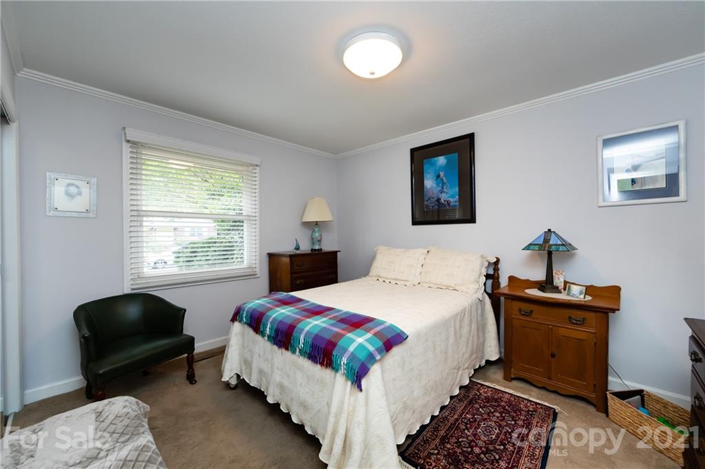 731 Lochridge Road Charlotte, NC 28209 - Photo 16 of 31 a bedroom with double bed and a window