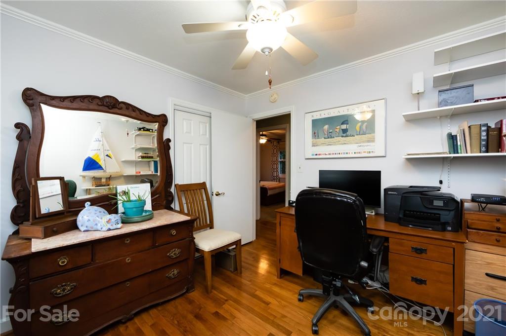 731 Lochridge Road Charlotte, NC 28209 - Photo 19 of 31 a view of a workspace with furniture and a window