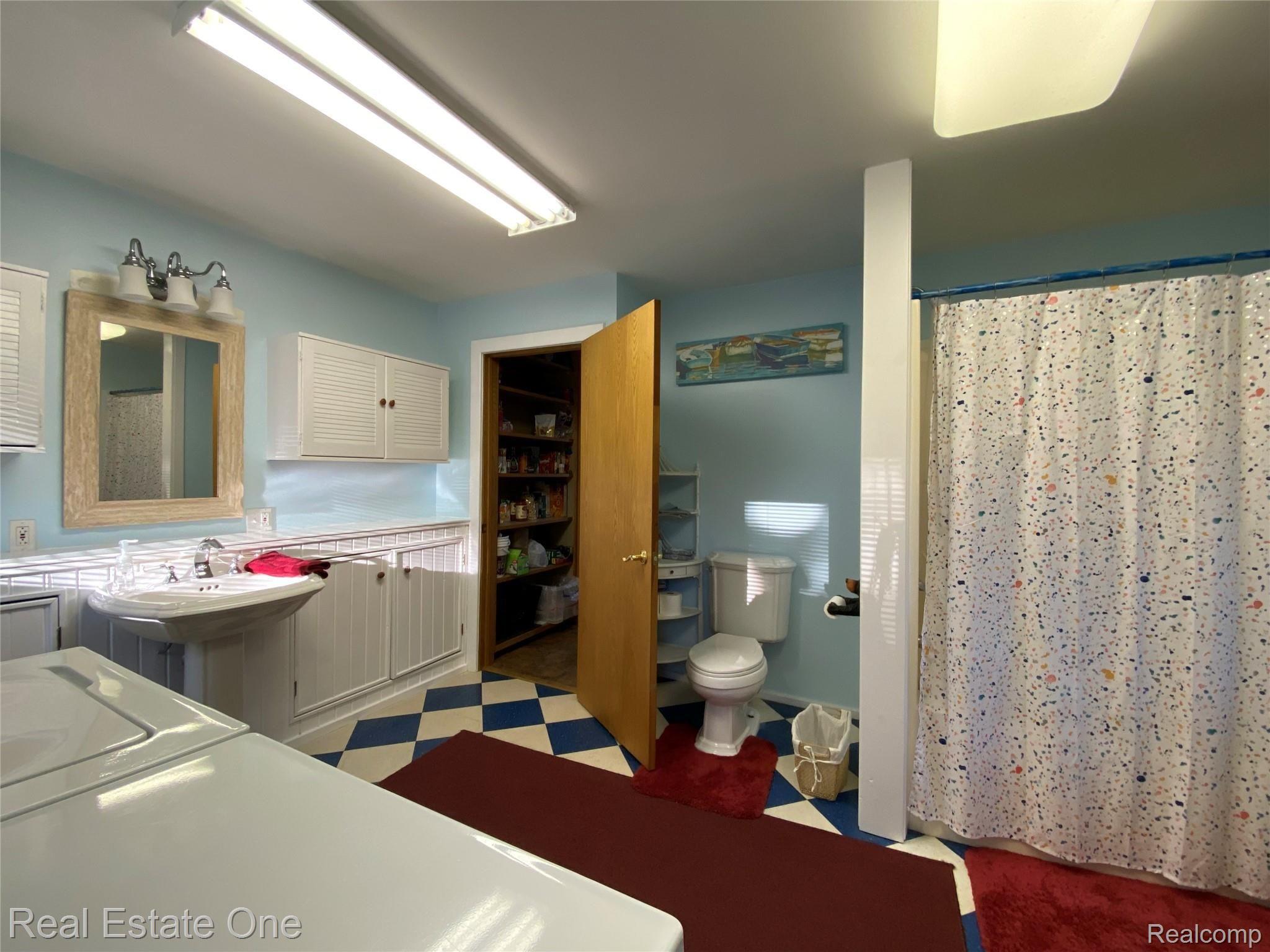 2722 Piney Ridge Road Ludington, MI 49431 - Photo 49 of 64 Combination laundry and full bathroom