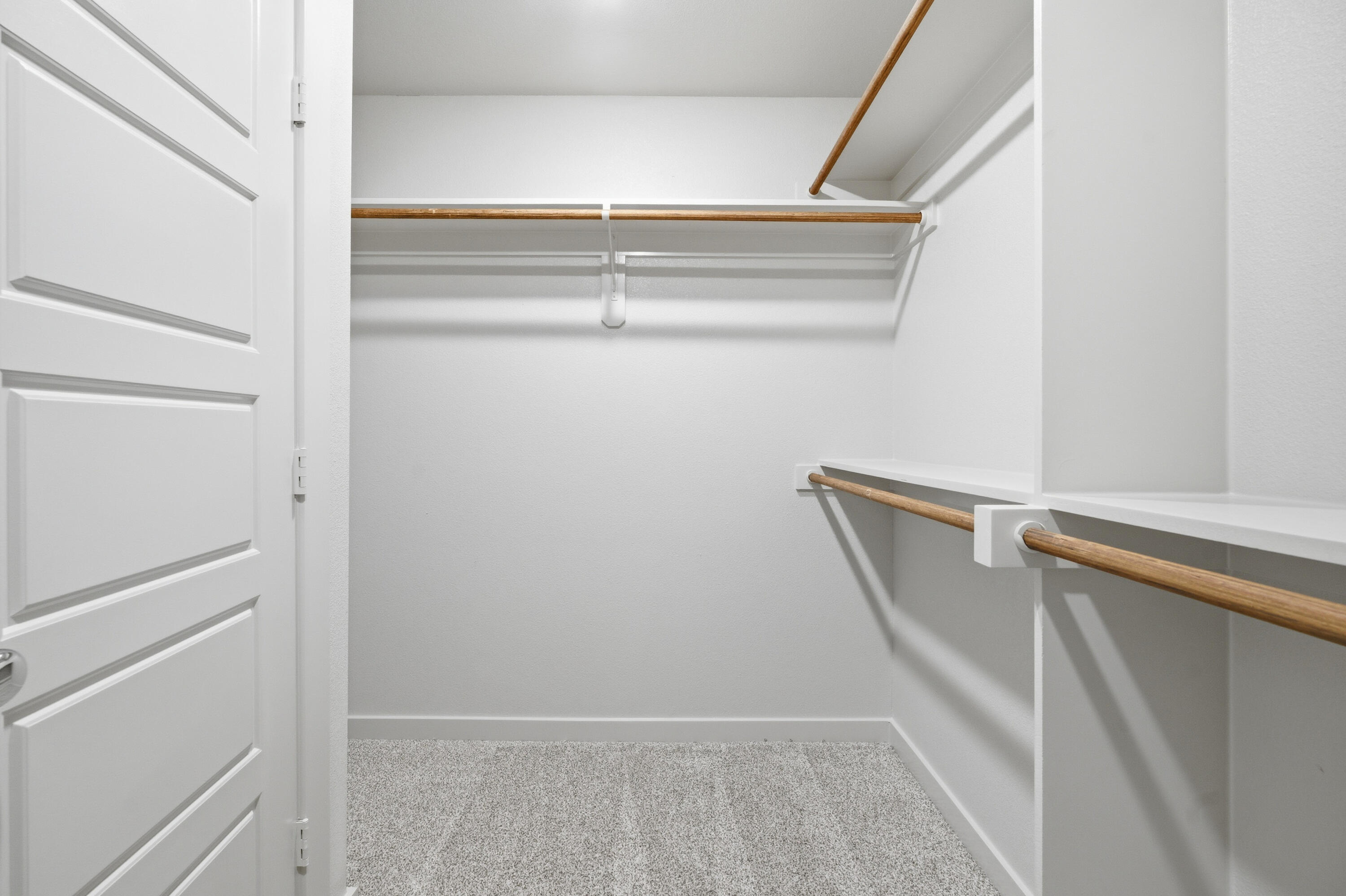 616 East 13th Street Wolfforth, TX 79382 - Photo 23 of 34 a view of storage and utility room with racks on the wall