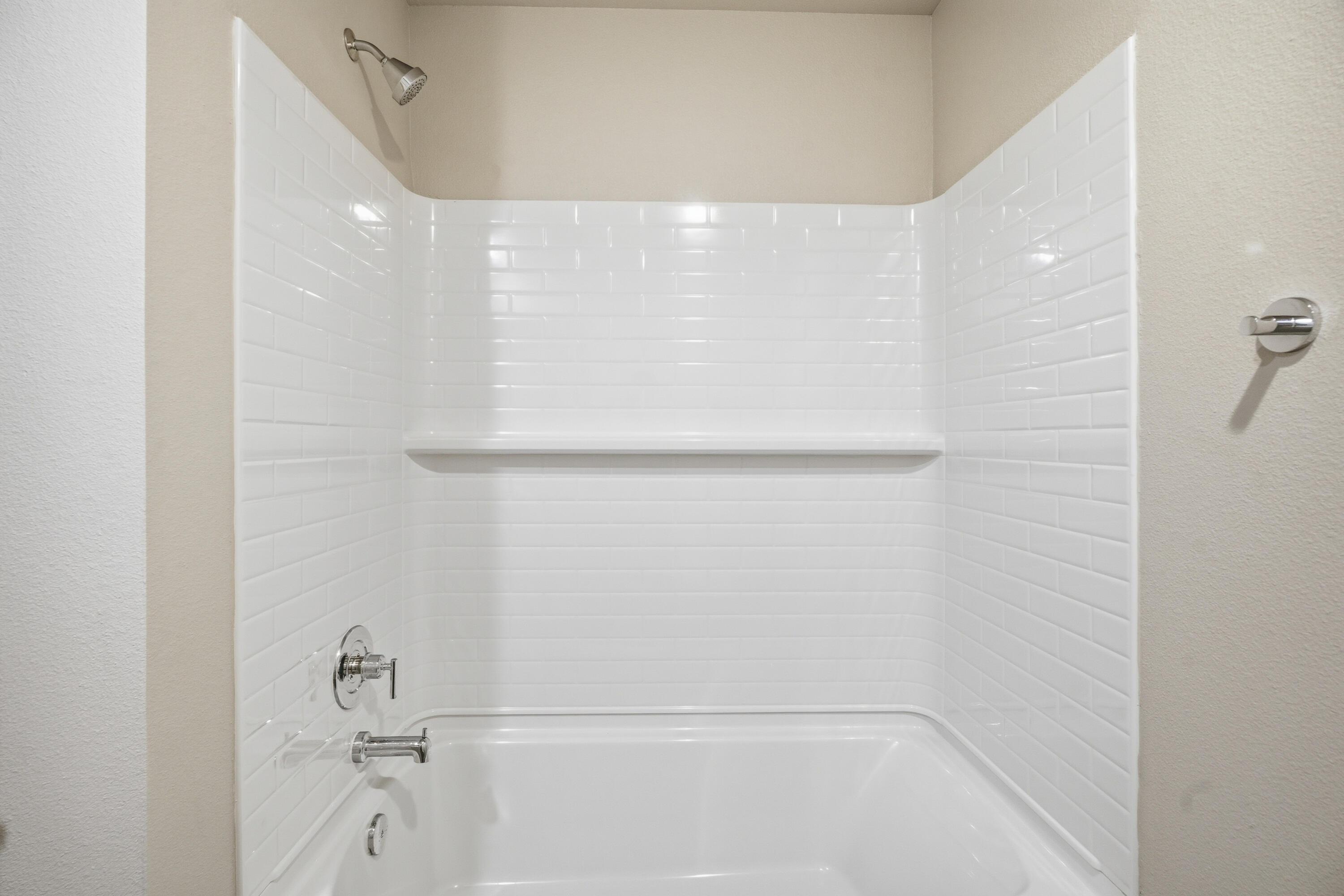 616 East 13th Street Wolfforth, TX 79382 - Photo 29 of 34 a bathroom with a shower