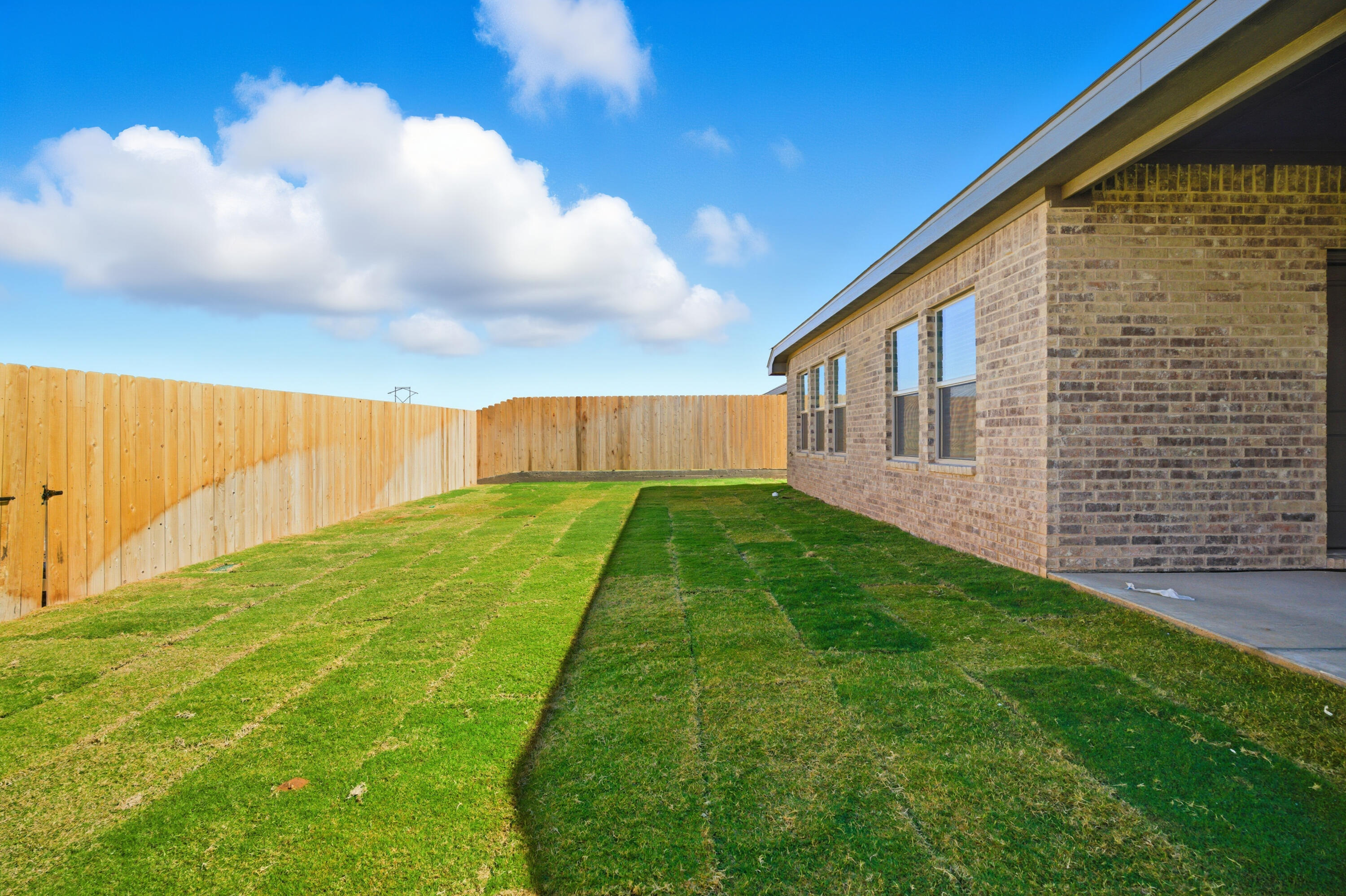 616 East 13th Street Wolfforth, TX 79382 - Photo 34 of 34 a view of backyard with a garden and entertaining space