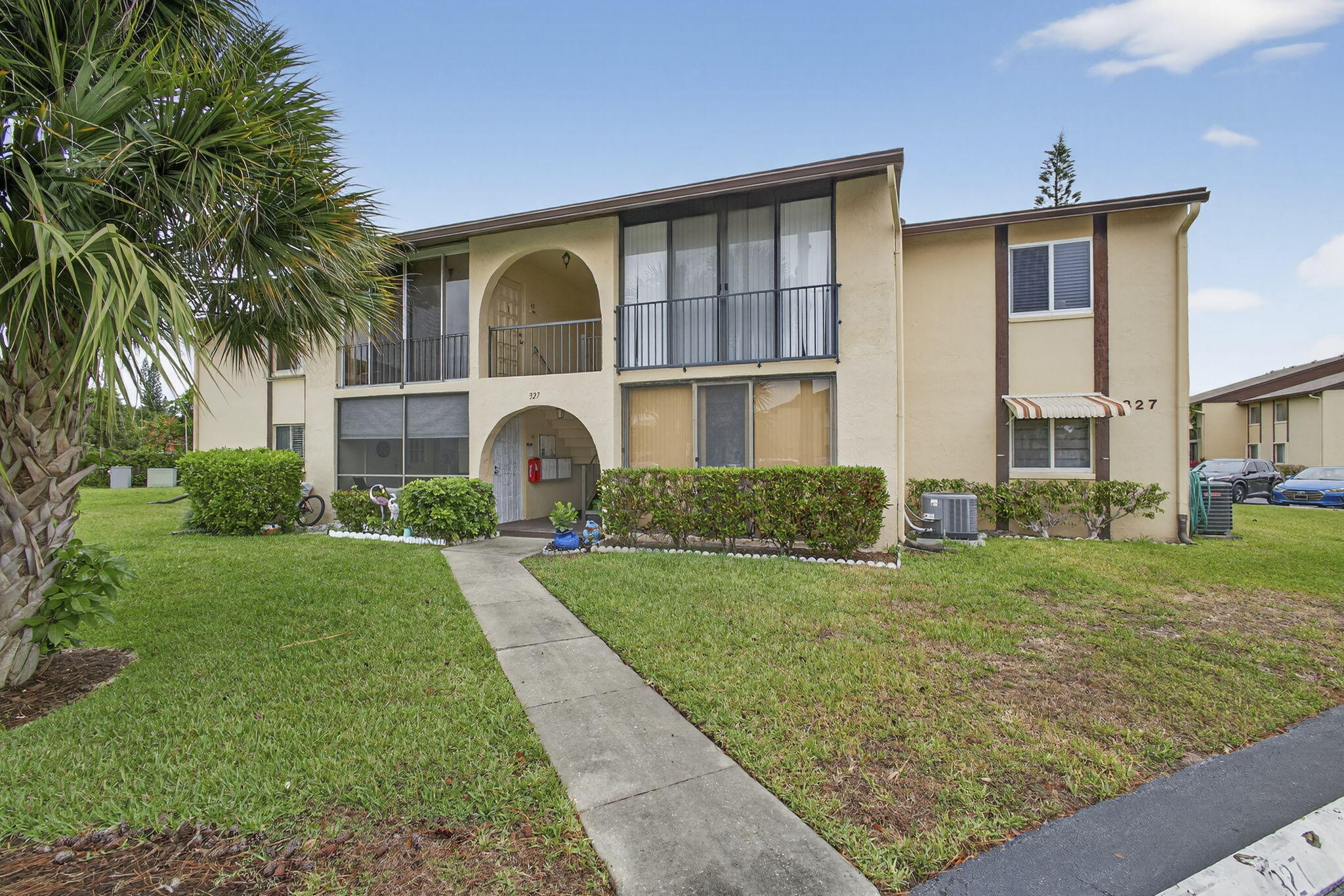 327 Pine Ridge Circle, Unit A1 Greenacres, FL 33463 - Photo 2 of 48 2-web-or-mls-BS1A2947