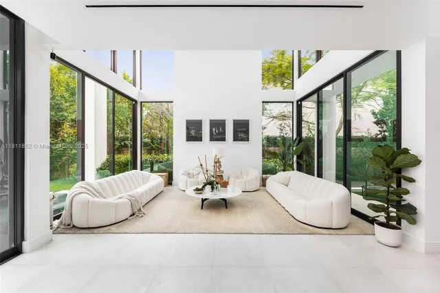 a kitchen with a sink and a refrigerator