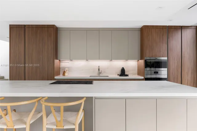 a view of a room with white walls