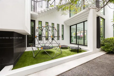 a view of a room with white walls