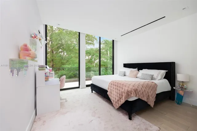 an empty room with windows and view