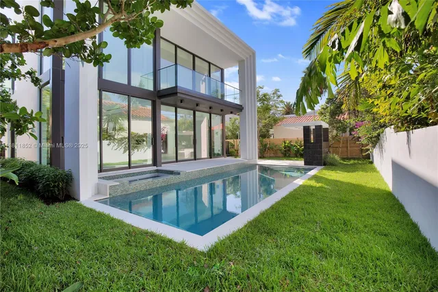 a view of a room with a large window