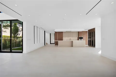 a bathroom with a bathtub sink and mirror