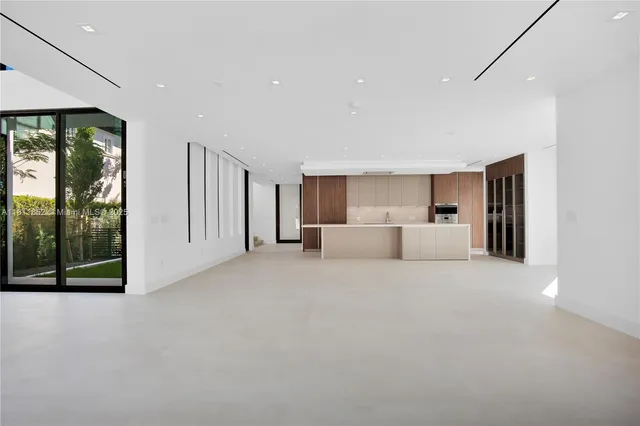 a bathroom with a bathtub sink and mirror