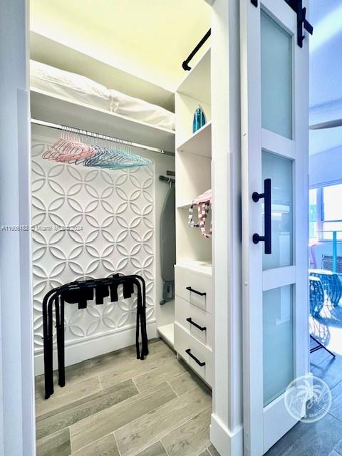 255 West 24th Street, Unit 308 Miami Beach, FL 33140 - Photo 14 of 31 a view of front door with wooden floor