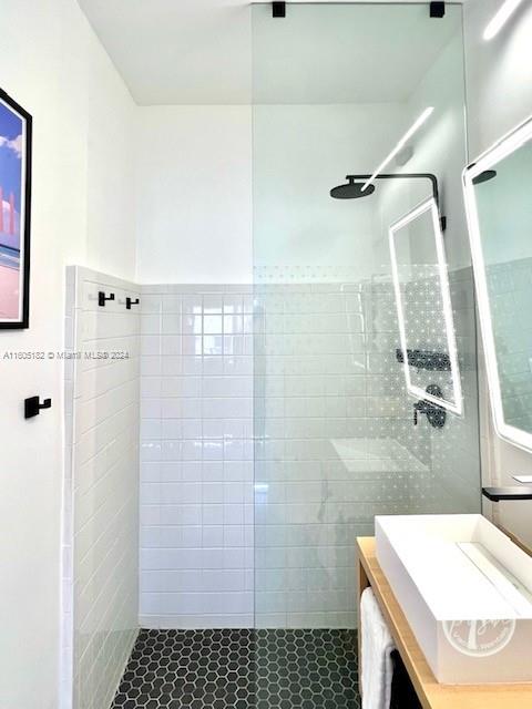 255 West 24th Street, Unit 308 Miami Beach, FL 33140 - Photo 17 of 31 a bathroom with a sink and a shower
