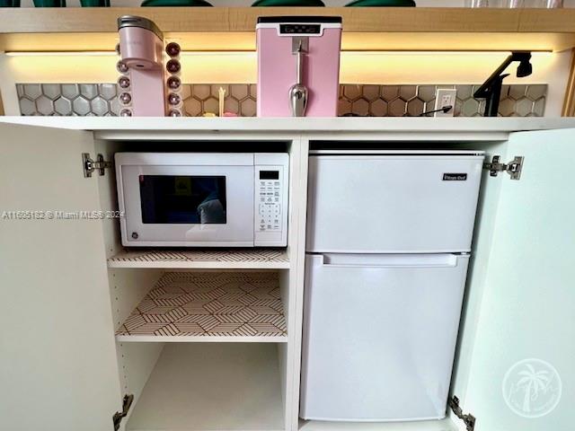 255 West 24th Street, Unit 308 Miami Beach, FL 33140 - Photo 20 of 31 a view of washer and dryer